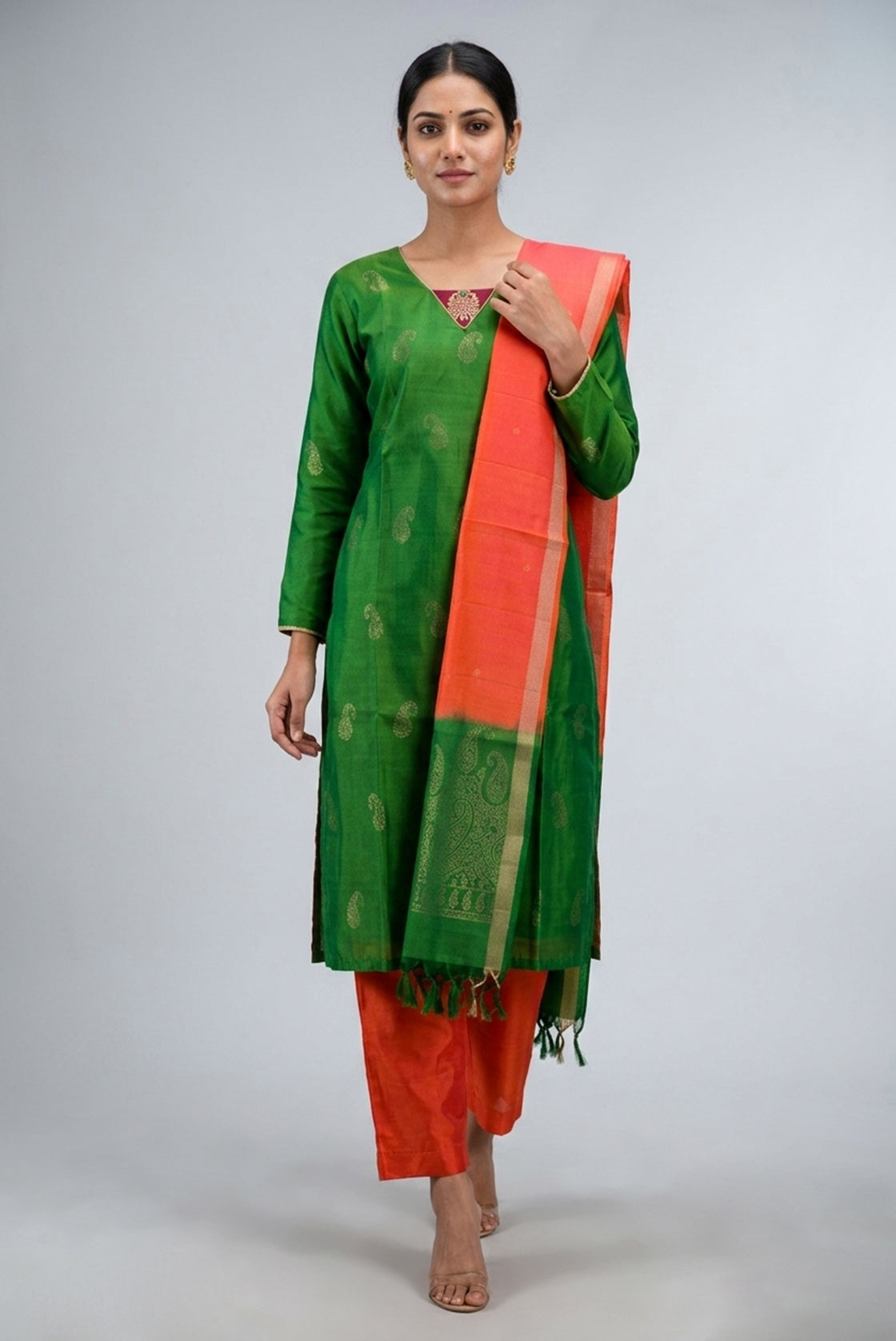 Green Pure Silk Womens Kurta set featuring Zari Butta Kurta paired with Orange Plain Body bottom and a Zari Butta dupatta in Orange front image displayed on an AI model