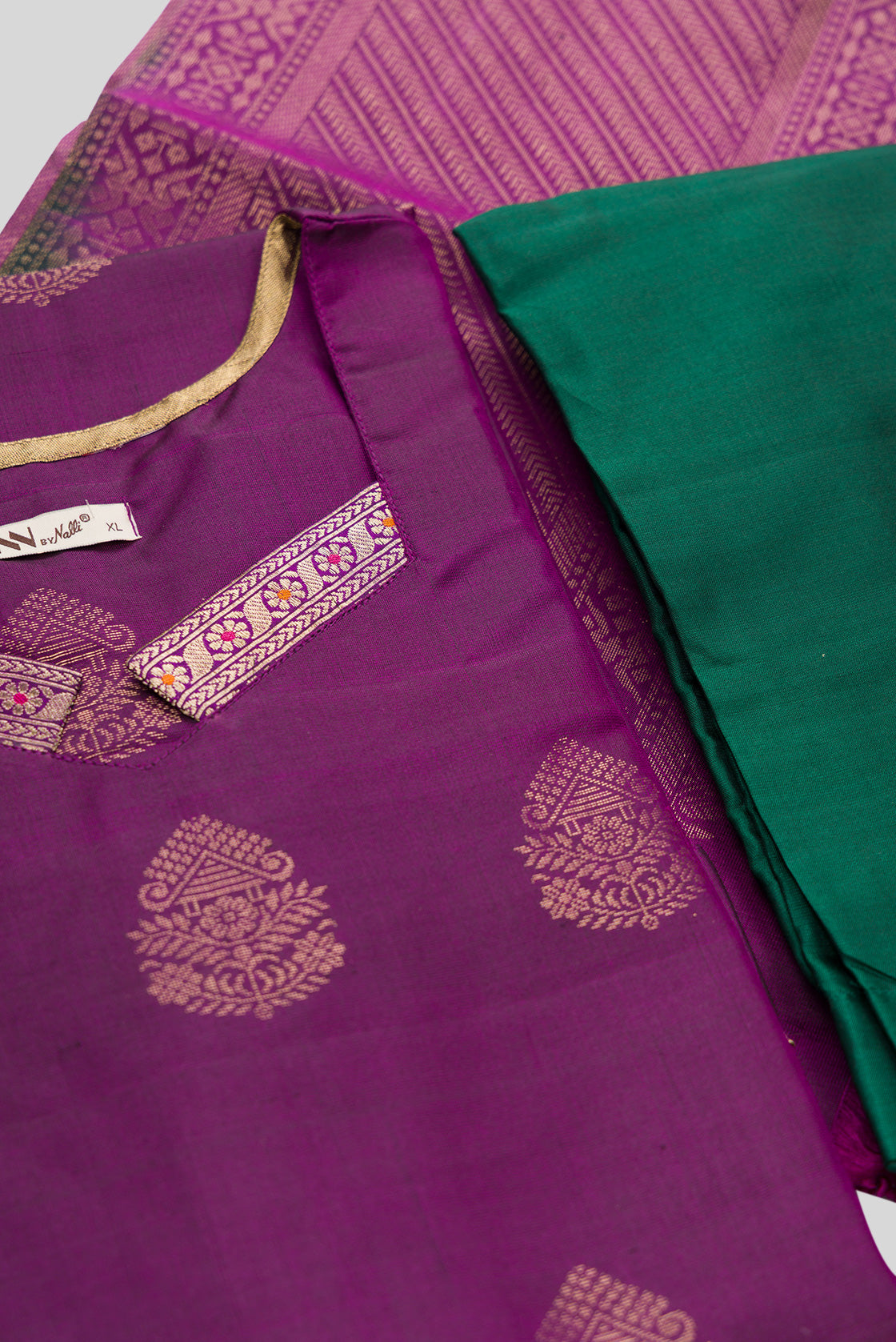 Detailed shot of Violet Pure Silk Womens Kurta set featuring Zari Butta Kurta paired with Bottle Green Plain Body bottom and a Zari Butta dupatta in Bottle Green