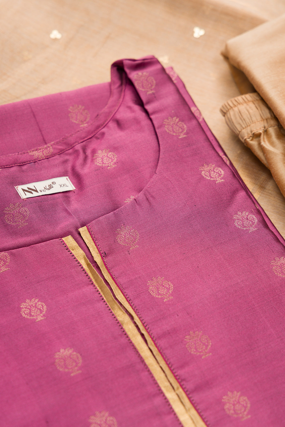 Detailed shot of Purple Pure Silk Womens Kurta set featuring Zari Butta Kurta paired with Gold Plain Body bottom and a Zari Butta dupatta in Gold