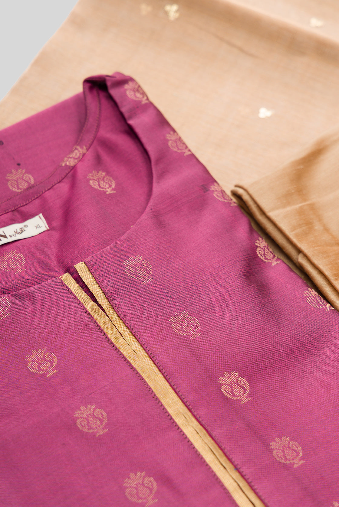 Detailed shot of Pink Pure Silk Womens Kurta set featuring Zari Butta Kurta paired with Dark Beige Plain Body bottom and a Zari Butta dupatta in Dark Beige