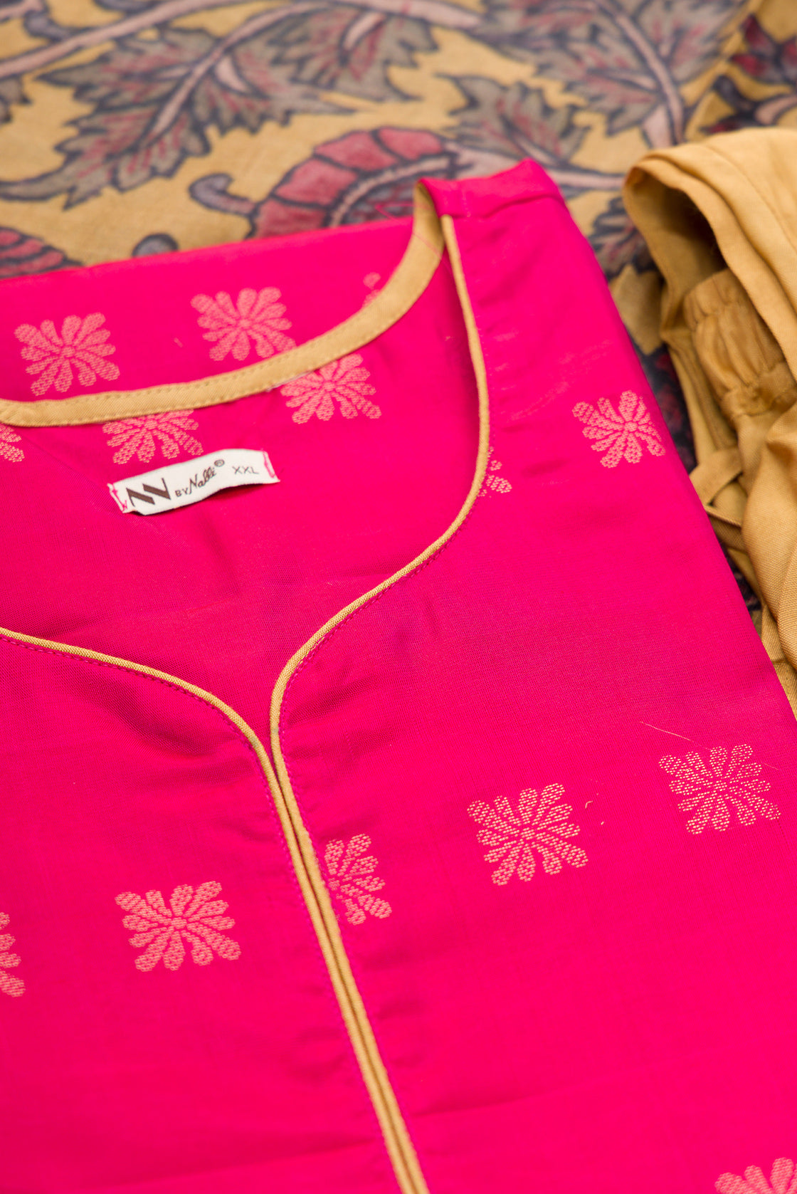 Detailed shot of Dark Pink Pure Silk Womens Kurta set featuring Zari Butta Kurta paired with Gold Plain Body bottom and a Printed dupatta in Gold