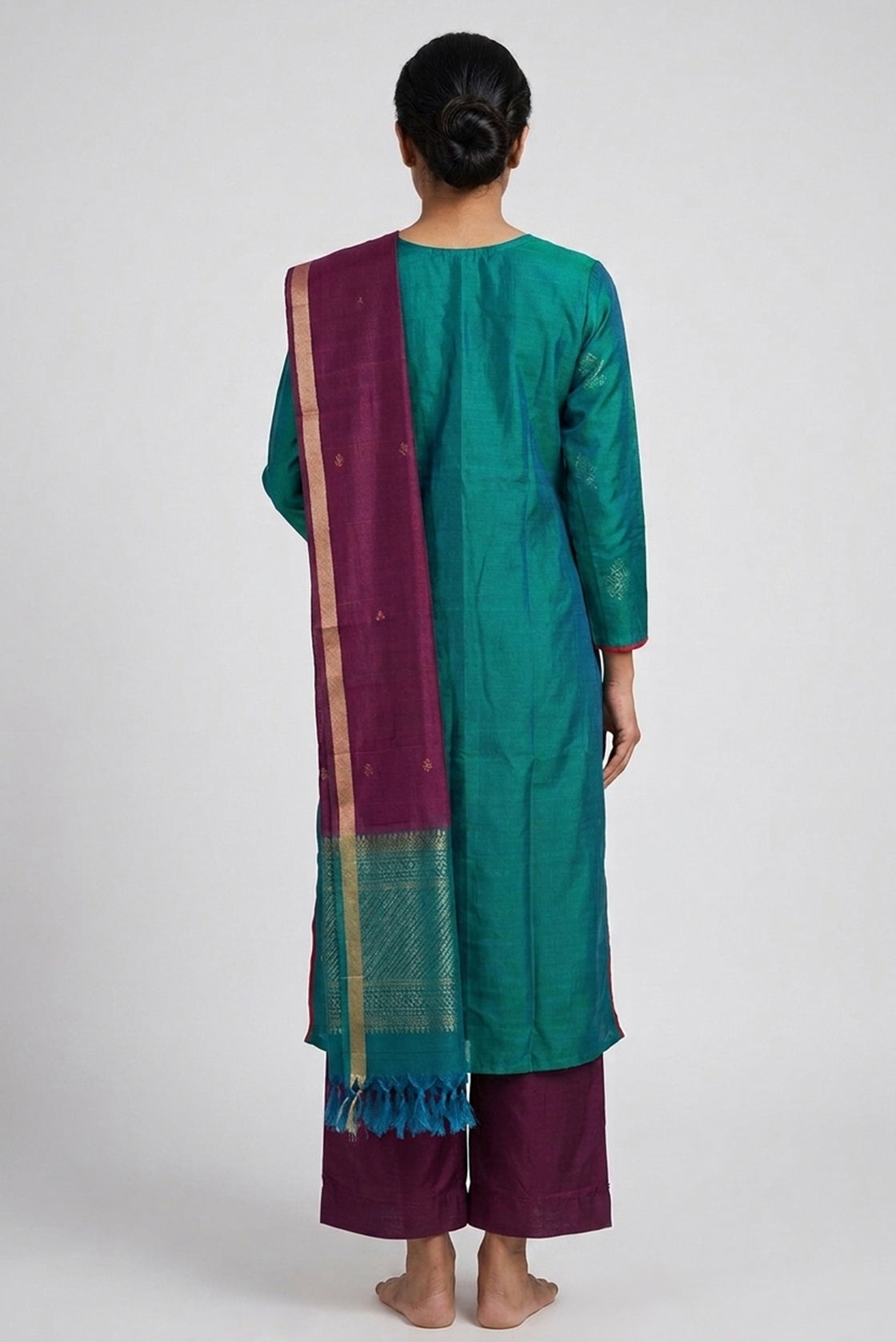 Green Pure Silk Womens Kurta set featuring Zari Butta Kurta paired with Burgundy Plain Body bottom and a Zari Butta dupatta in Burgundy back image displayed on an AI model
