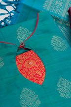 Detailed shot of Green Pure Silk Womens Kurta set featuring Zari Butta Kurta paired with Burgundy Plain Body bottom and a Zari Butta dupatta in Burgundy