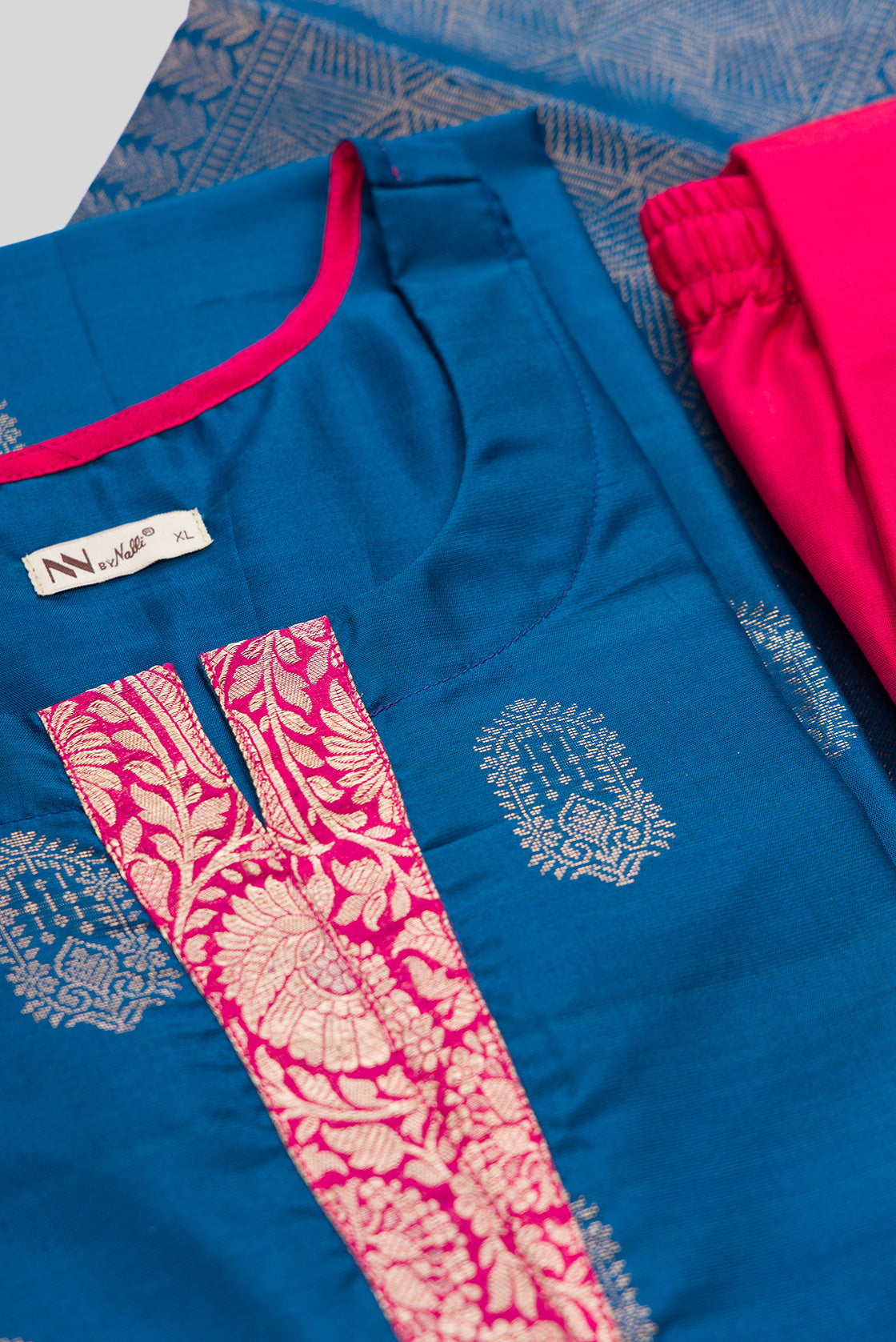 Detailed shot of Peacock Blue Pure Silk Womens Kurta set featuring Zari Butta Kurta paired with Pink Plain Body bottom and a Zari Butta dupatta in Pink
