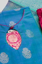 Detailed shot of Peacock Blue Pure Silk Womens Kurta set featuring Zari Butta Kurta paired with Maroon Plain Body bottom and a Zari Butta dupatta in Maroon