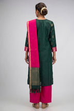 Green Pure Silk Womens Kurta set featuring Zari Butta Kurta paired with Magenta Plain Body bottom and a Zari Butta dupatta in Magenta back image displayed on an AI model