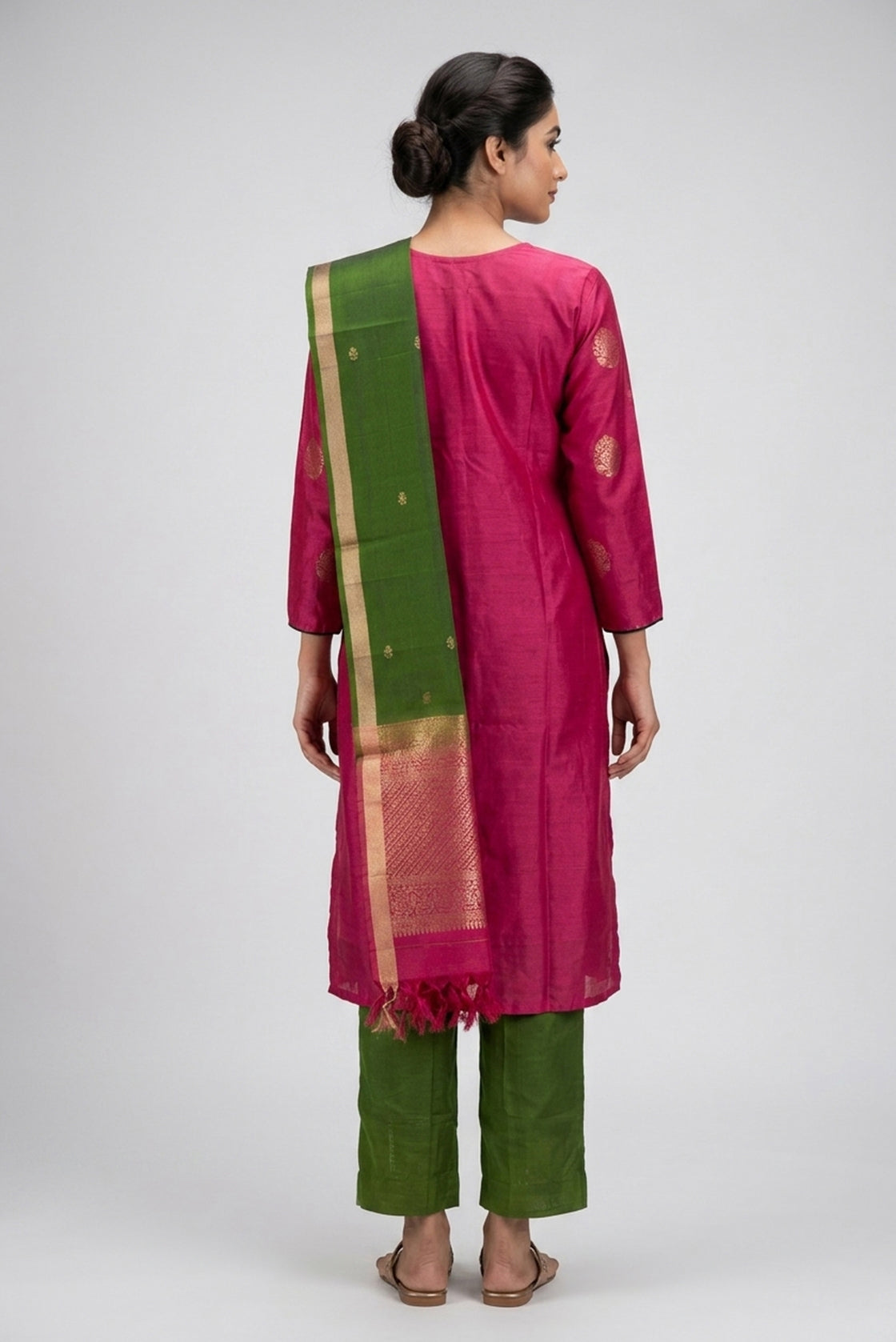 Pink Pure Silk Womens Kurta set featuring Zari Butta Kurta paired with Green Plain Body bottom and a Zari Butta dupatta in Green back image displayed on an AI model