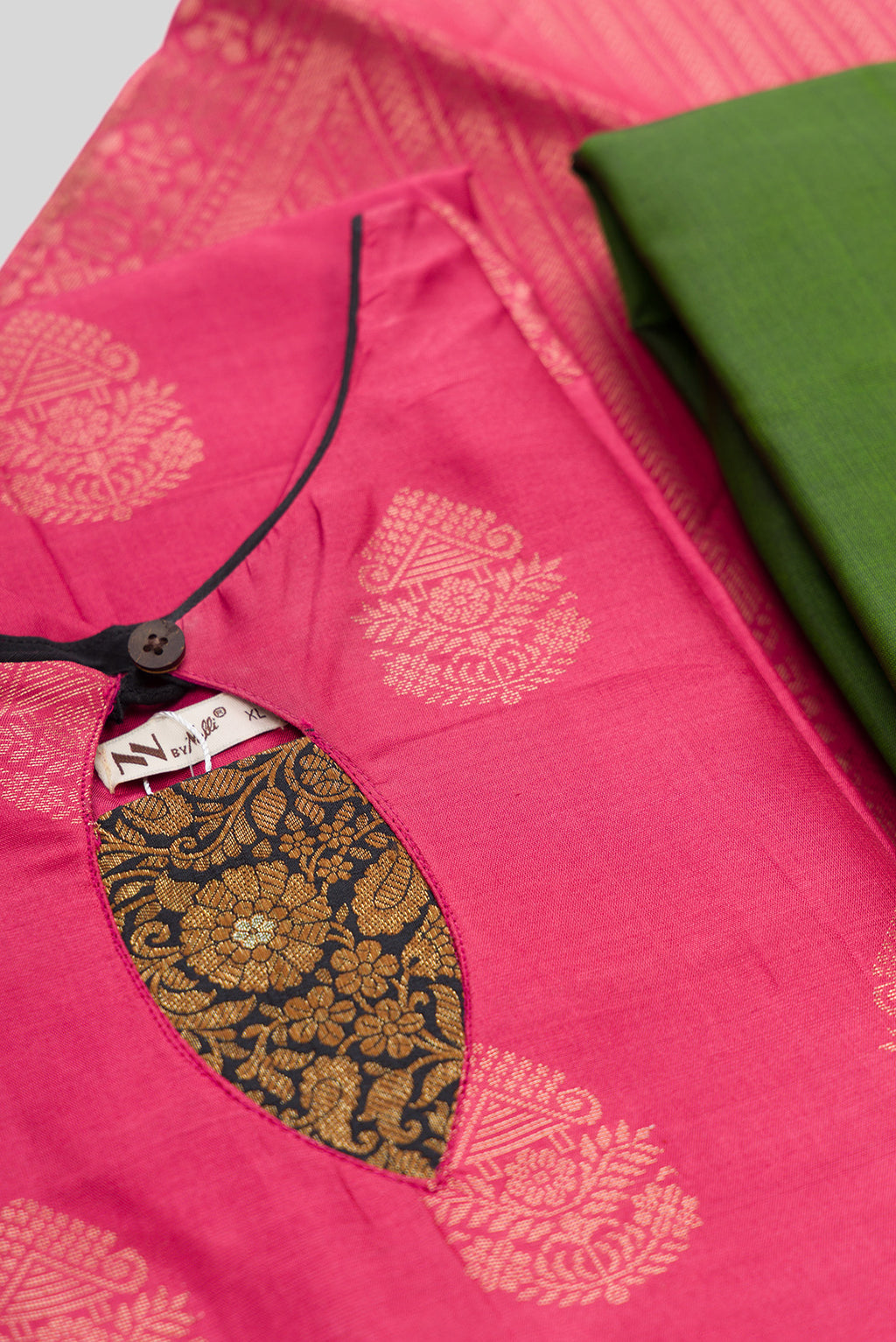 Detailed shot of Pink Pure Silk Womens Kurta set featuring Zari Butta Kurta paired with Green Plain Body bottom and a Zari Butta dupatta in Green