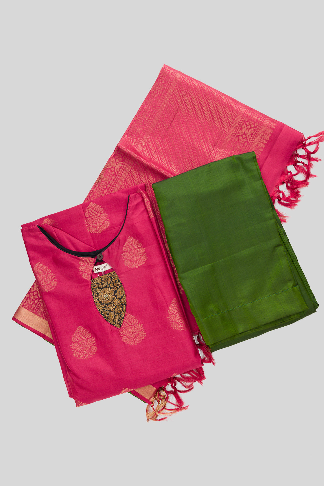 Flat lay of Pink Pure Silk Womens Kurta set featuring Zari Butta Kurta paired with Green Plain Body bottom and a Zari Butta dupatta in Green