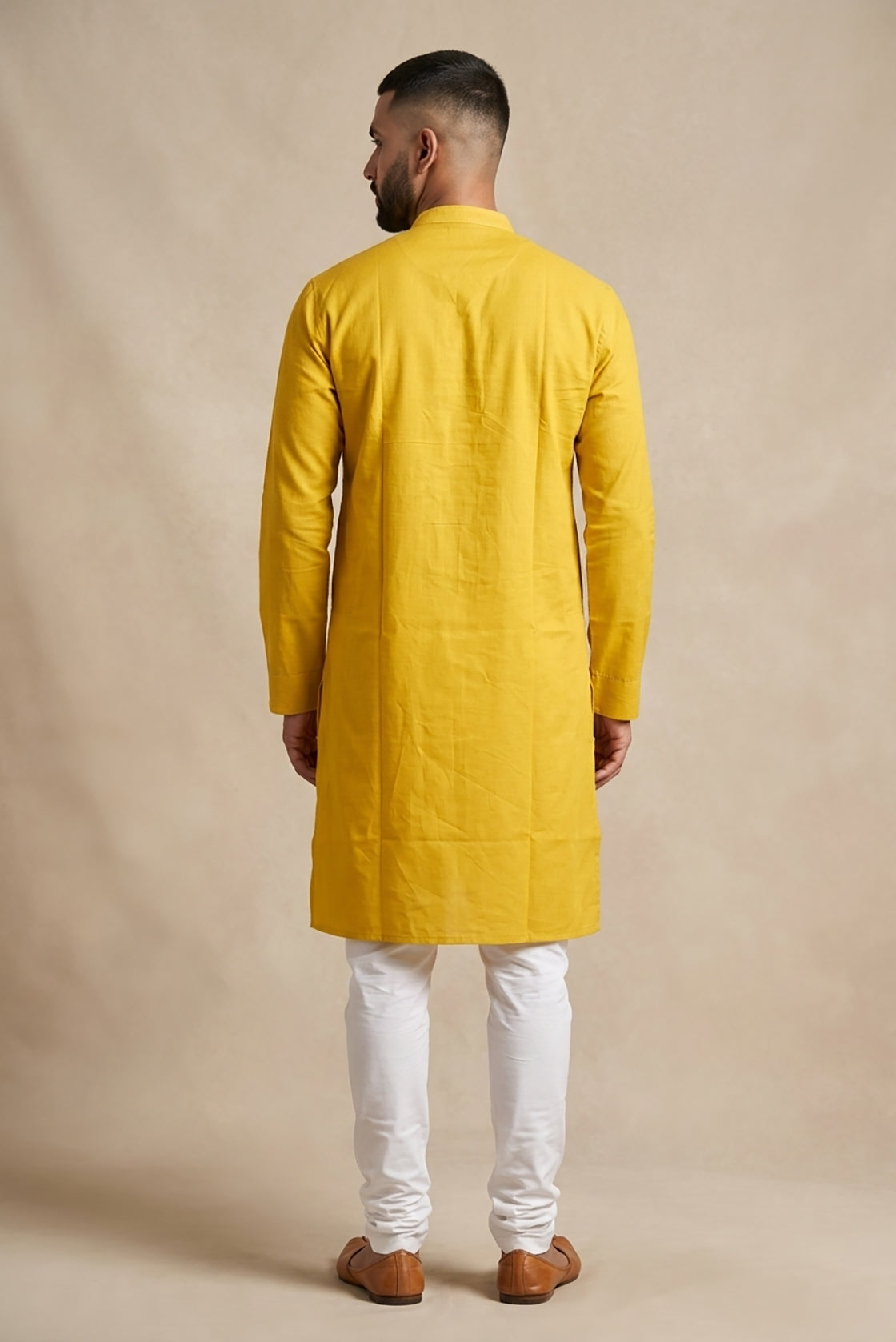 Yellow Pure Silk Plain Body Mens Kurta back image displayed on an AI model