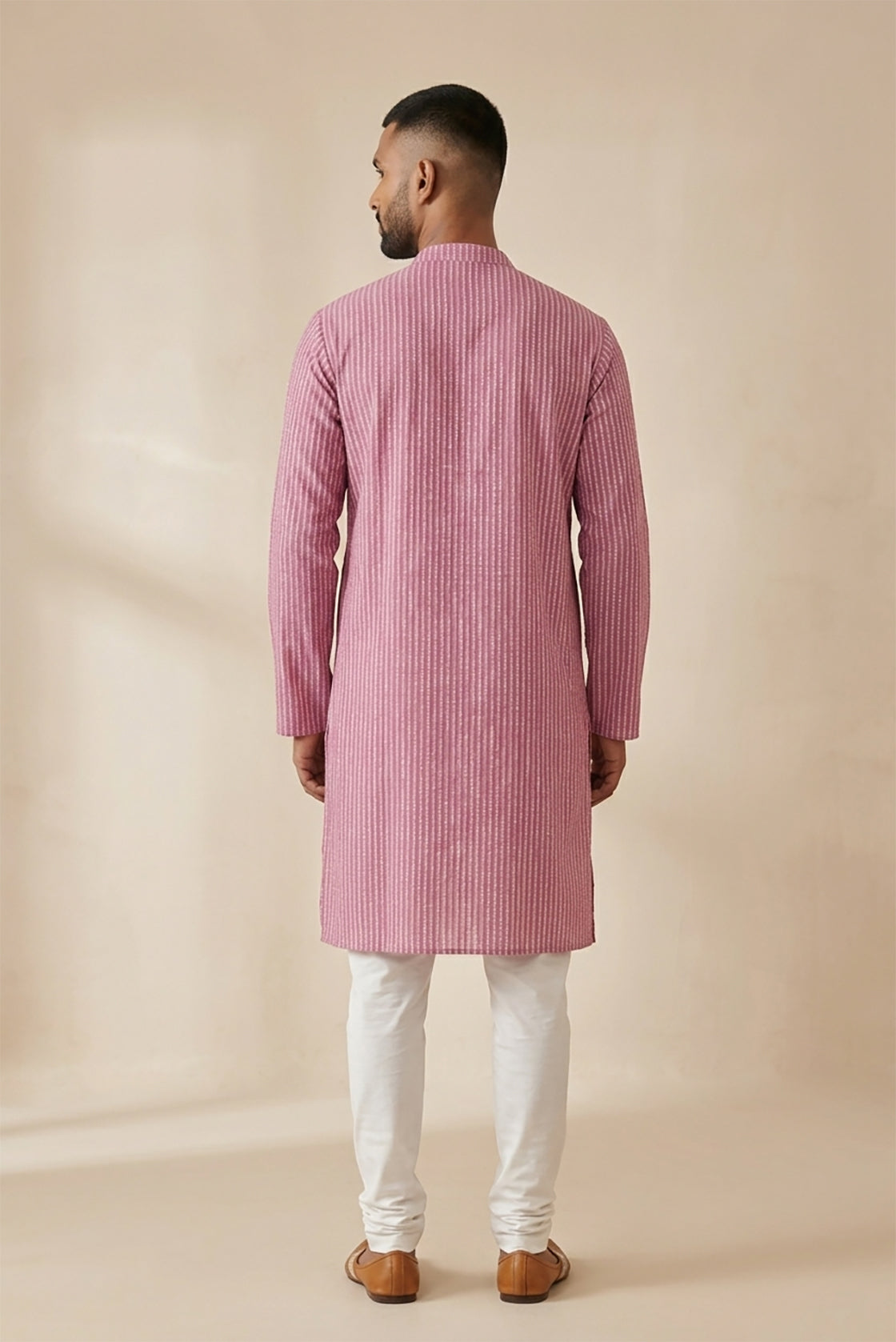 Pink Pure Cotton Stripes Mens Kurta back image displayed on an AI model