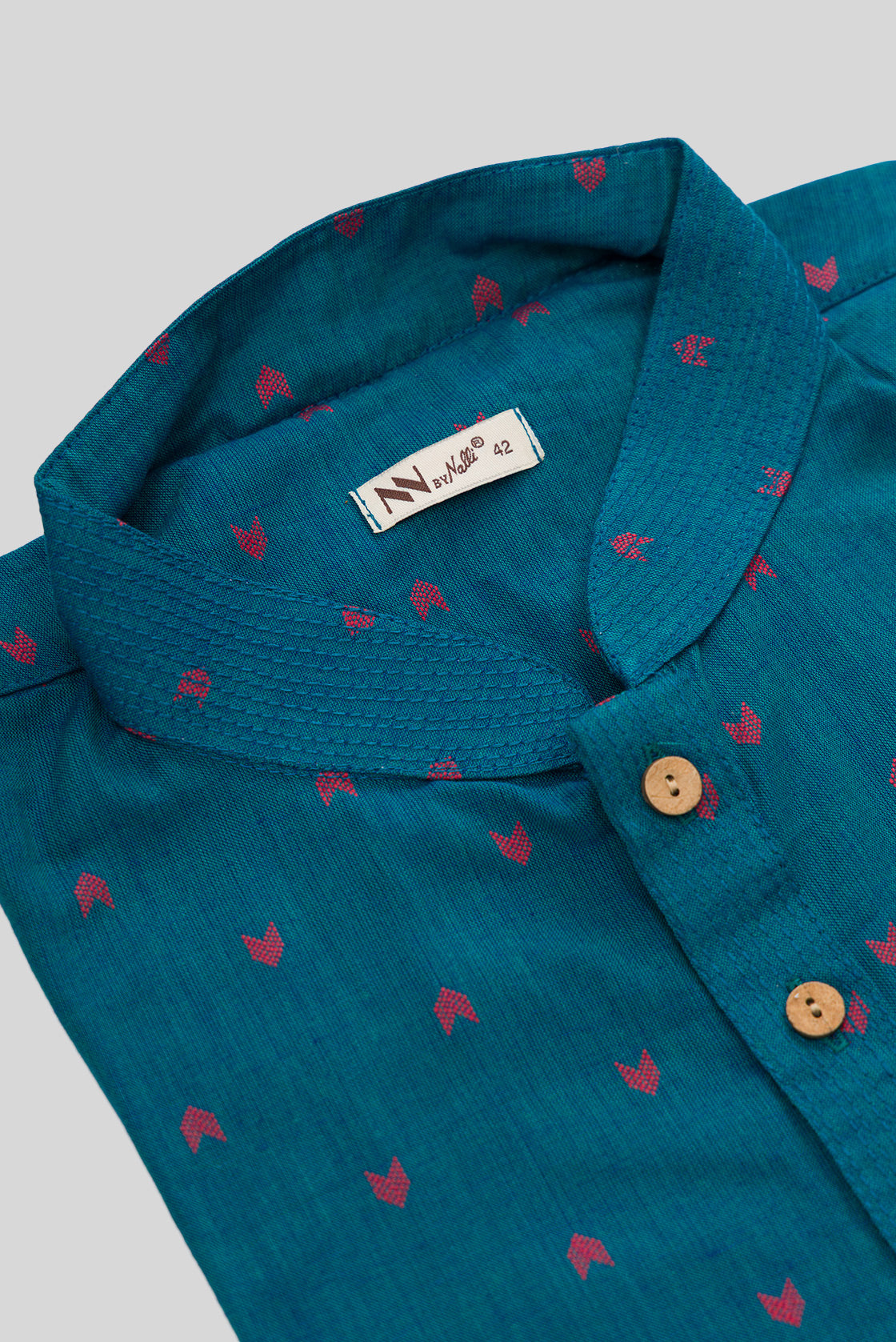 Detailed shot of Peacock Blue Pure Cotton Thread Butta Mens Kurta