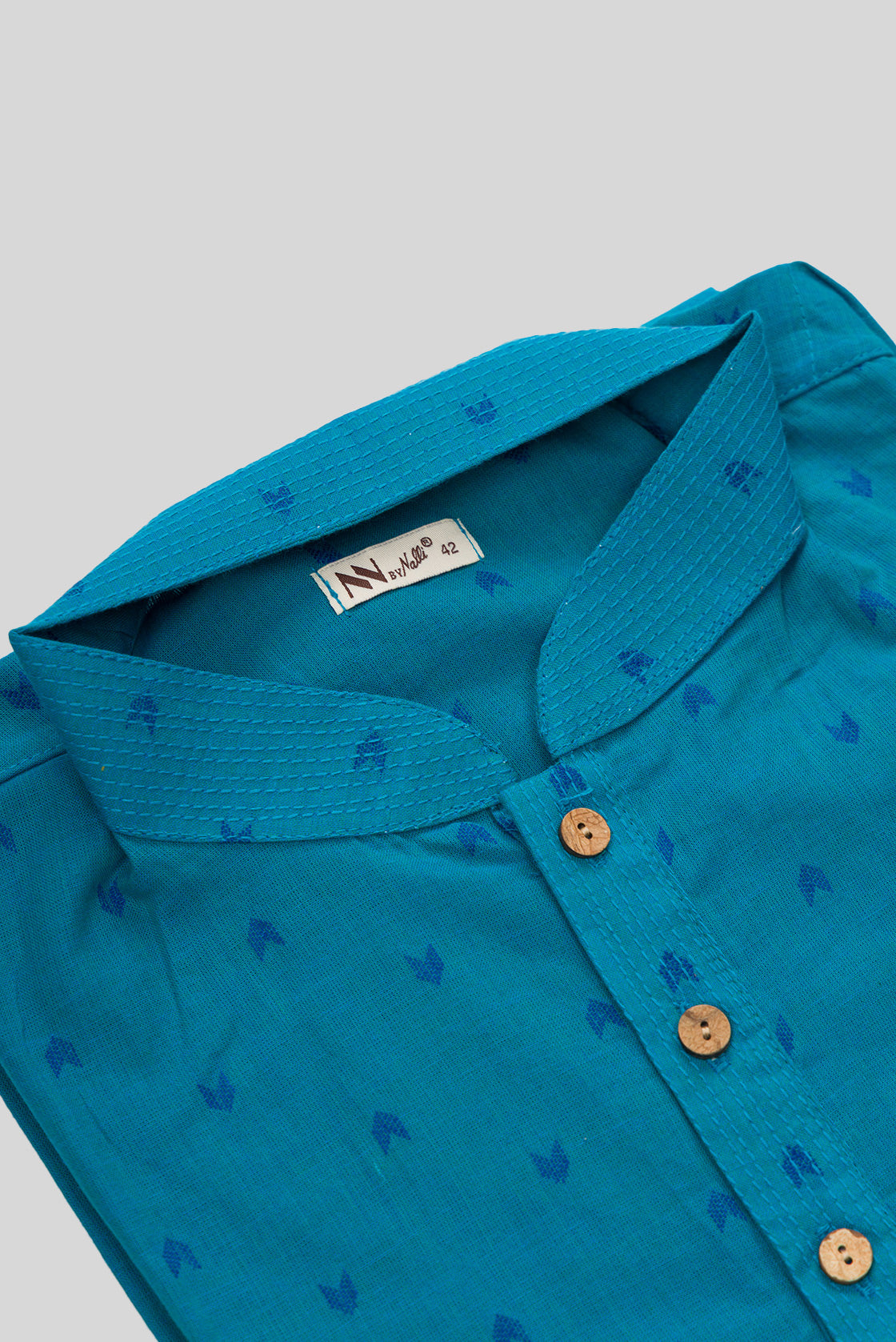 Detailed shot of Peacock Blue Pure Cotton Thread Butta Mens Kurta
