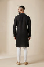 Black Pure Cotton Plain Body Mens Kurta back image displayed on an AI model