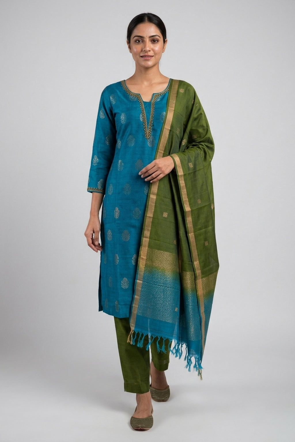 Peacock Blue Pure Silk Womens Kurta set featuring Zari Butta Kurta paired with Green Plain Body bottom and a Zari Butta dupatta in Green front image displayed on an AI model