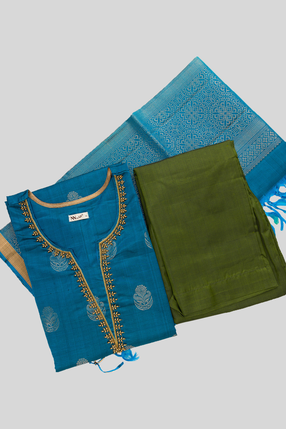 Flat lay of Peacock Blue Pure Silk Womens Kurta set featuring Zari Butta Kurta paired with Green Plain Body bottom and a Zari Butta dupatta in Green