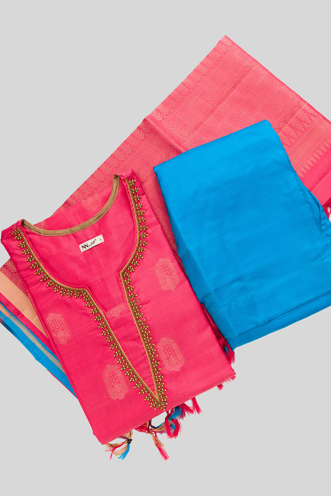 Flat lay of Rose pink Pure Silk Womens Kurta set featuring Zari Butta Kurta paired with Sky Blue Plain Body bottom and a Zari Butta dupatta in Sky Blue