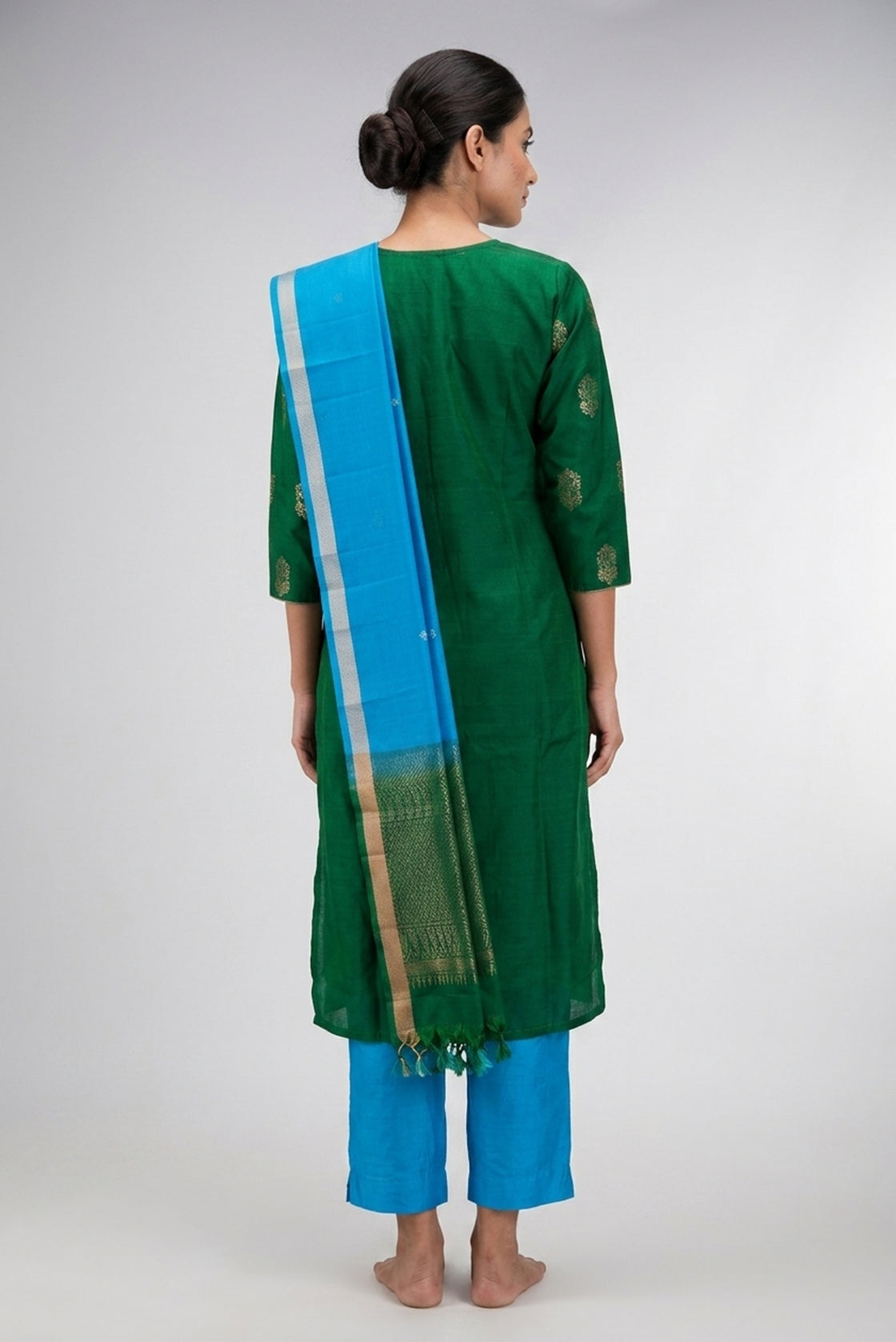 Green Pure Silk Womens Kurta set featuring Embroidery Kurta paired with Sky Blue Plain Body bottom and a Zari Butta dupatta in Sky Blue back image displayed on an AI model