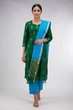 Green Pure Silk Womens Kurta set featuring Embroidery Kurta paired with Sky Blue Plain Body bottom and a Zari Butta dupatta in Sky Blue front image displayed on an AI model
