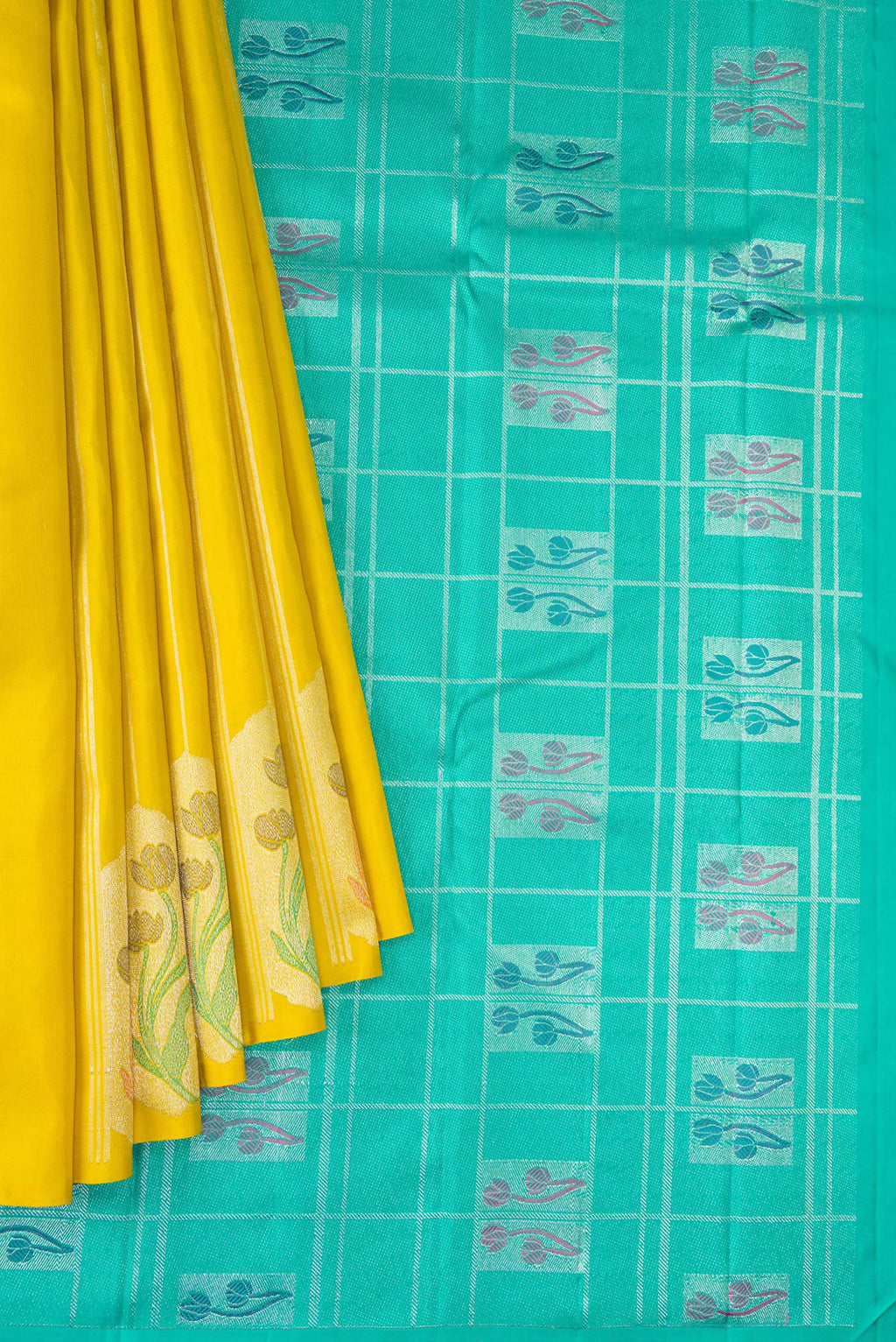 Pleats and pallu of Yellow Kanjivaram Silk Saree with Stripes on the body and Without Border. 