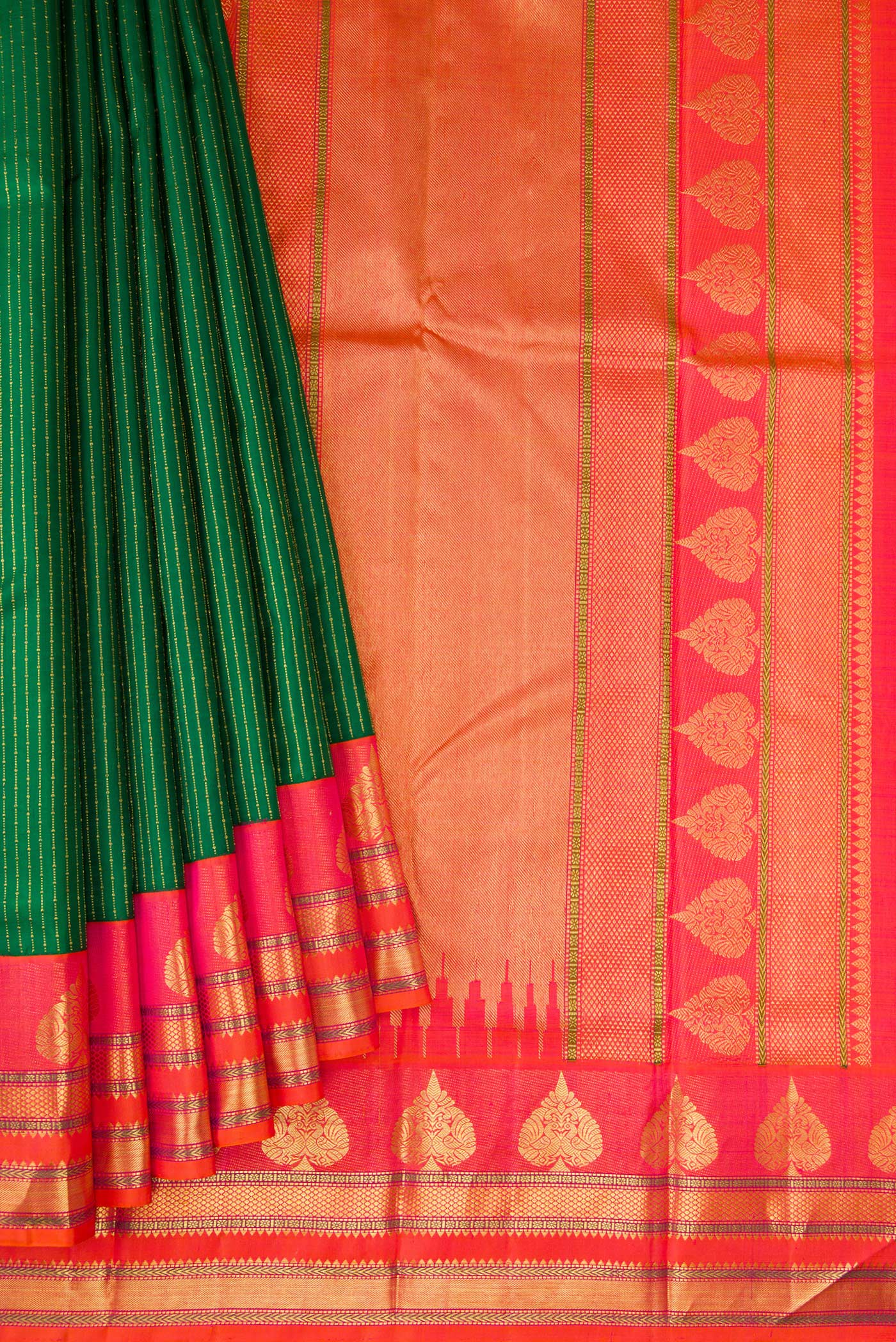 Pleats and pallu of Bottle Green Kanchipuram Silk Saree with Stripes on the body and Zari Border. 