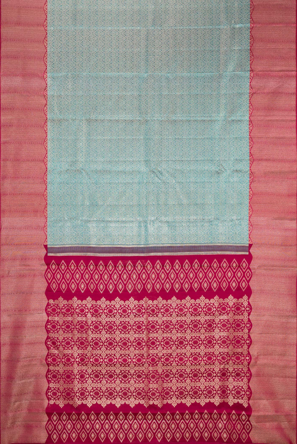 Flat view of Light Blue Kanchipuram Silk Saree with Zari Brocade on the body and Zari Border. 