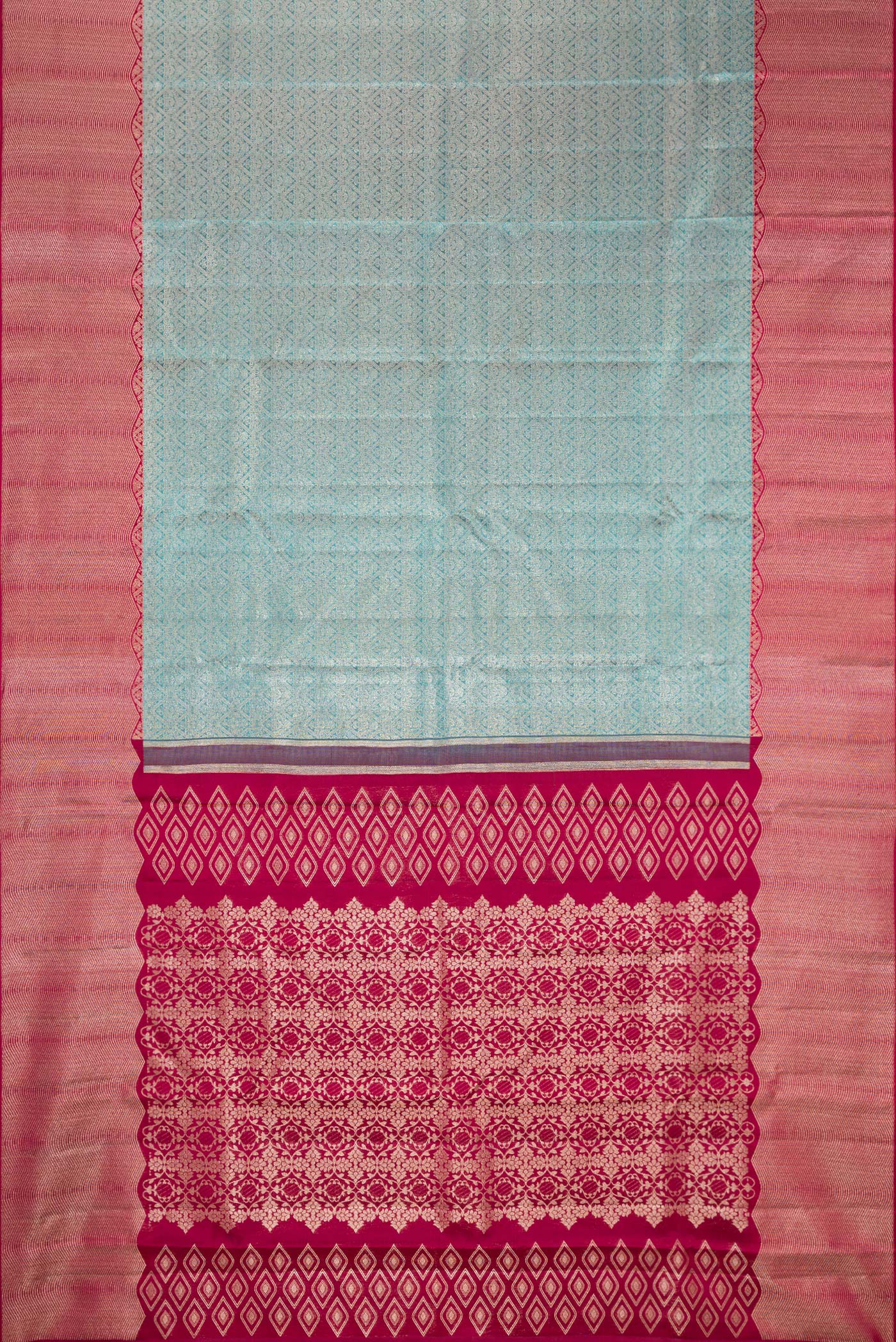 Flat view of Light Blue Kanchipuram Silk Saree with Zari Brocade on the body and Zari Border. 