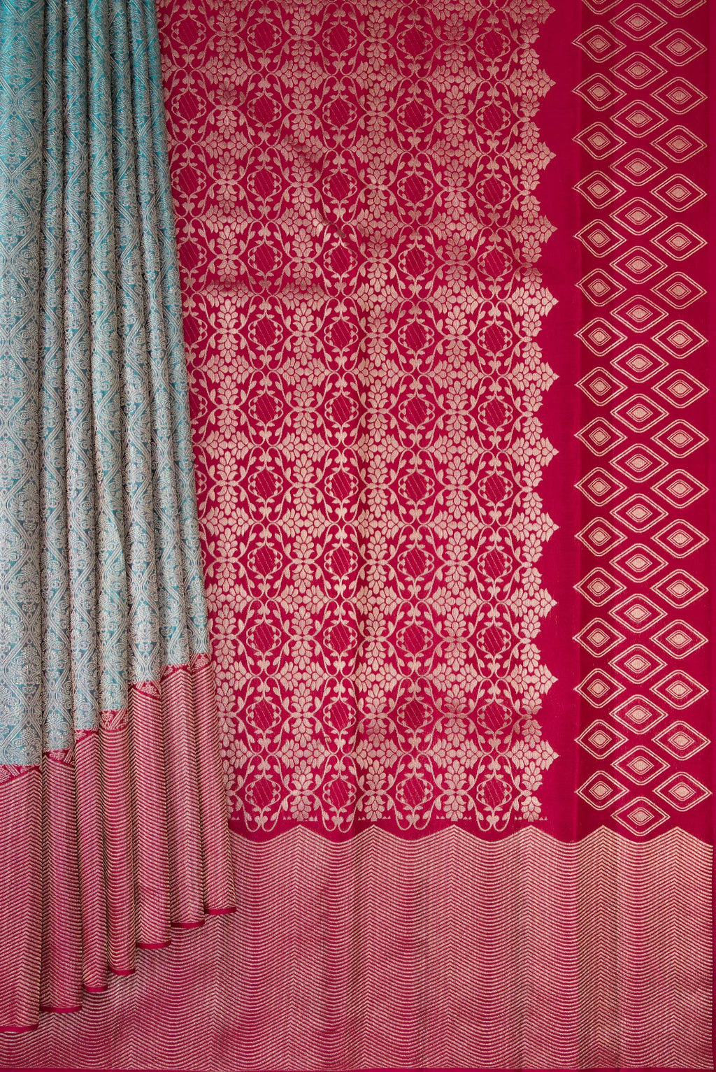 Pleats and pallu of Light Blue Kanchipuram Silk Saree with Zari Brocade on the body and Zari Border. 