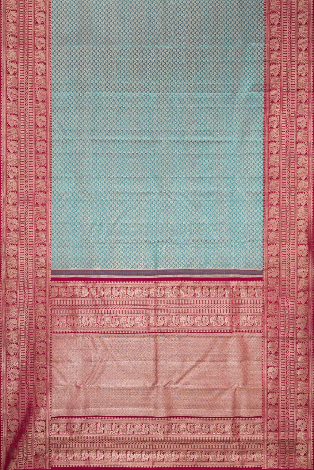 Flat view of Sky Blue Kanchipuram Silk Saree with Zari Brocade on the body and Fancy Border. 
