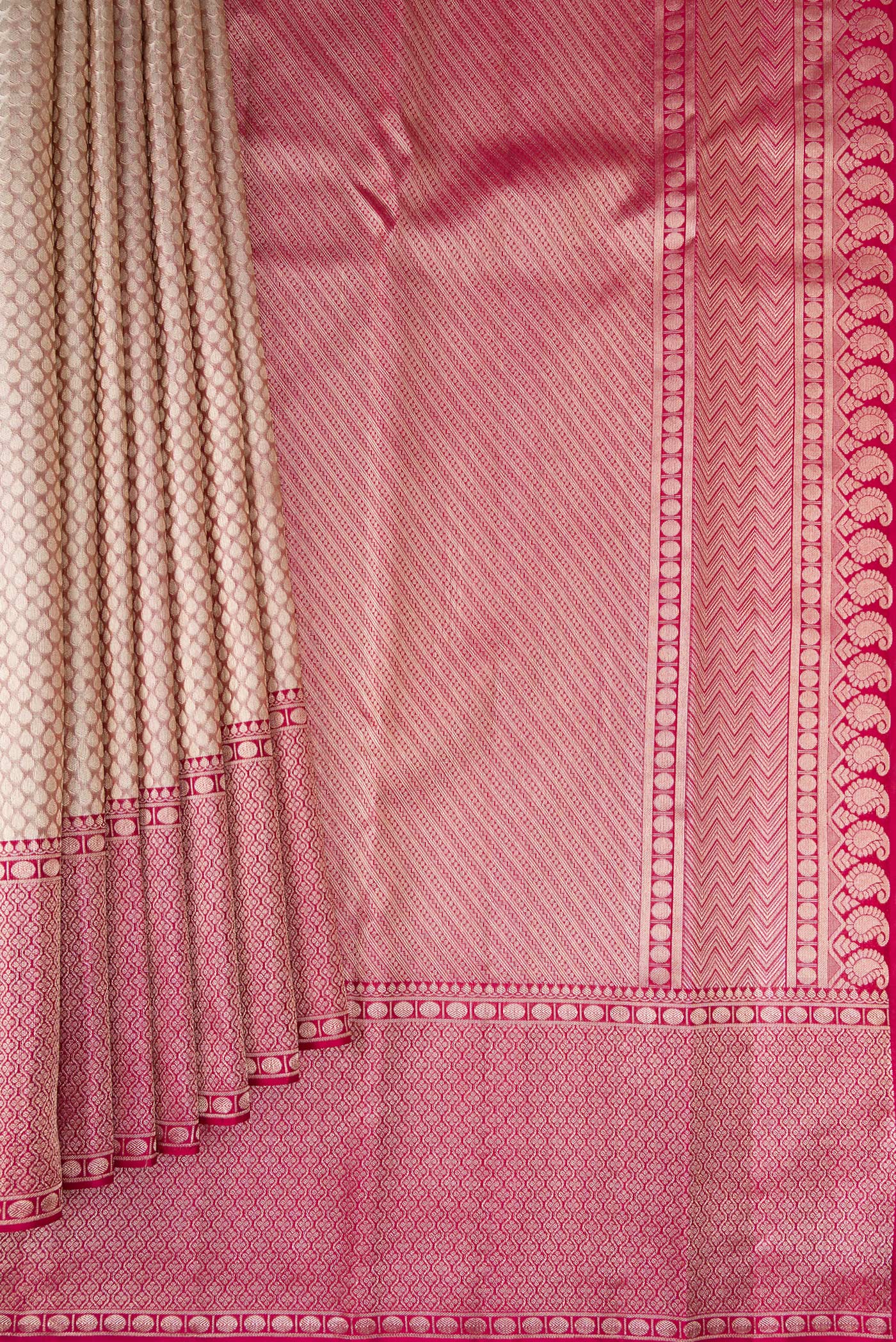 Pleats and pallu of Grey Kanchipuram Silk Saree with Zari Brocade on the body and Zari Border. 