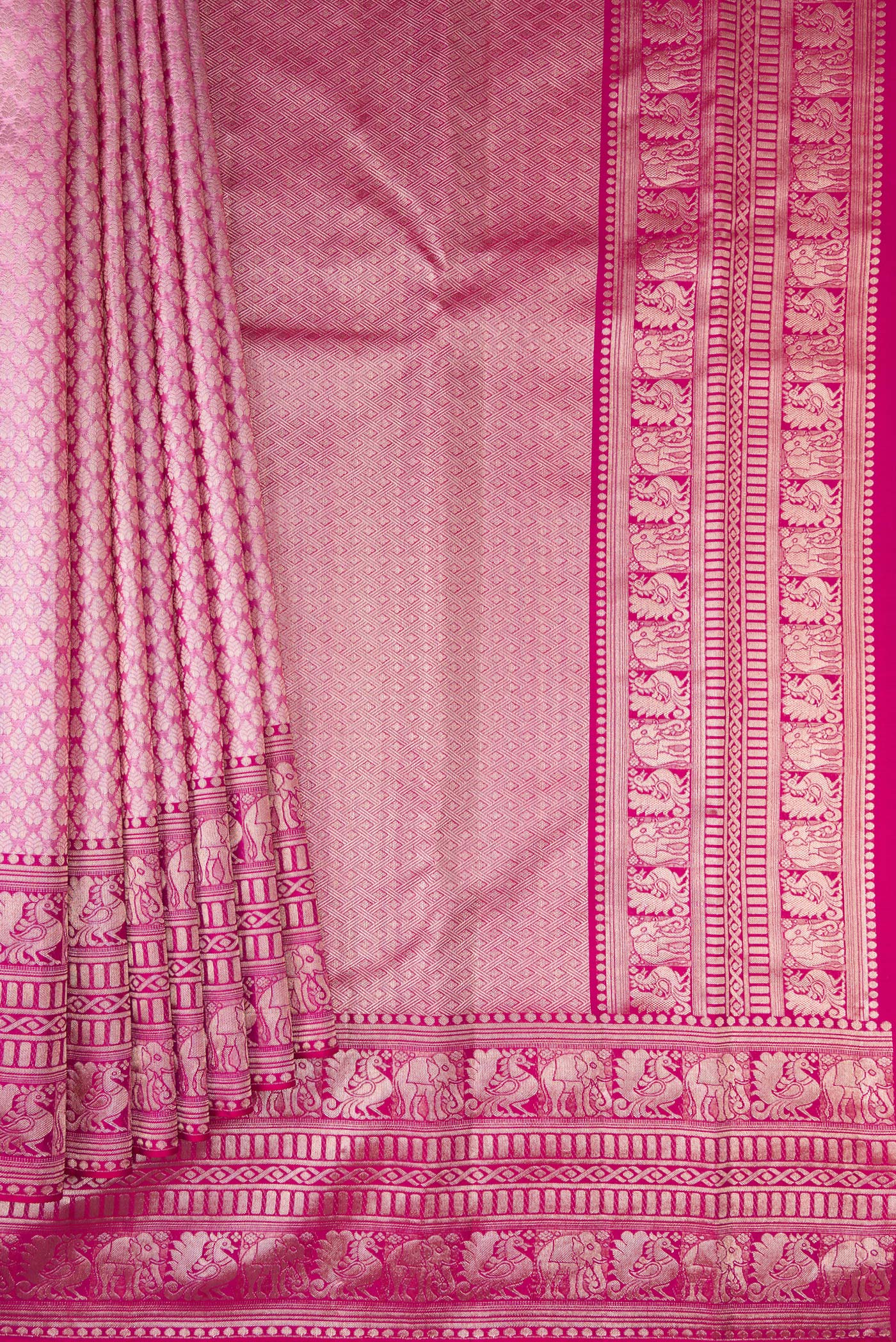 Pleats and pallu of Pink Kanchipuram Silk Saree with Zari Brocade on the body and Fancy Border. 