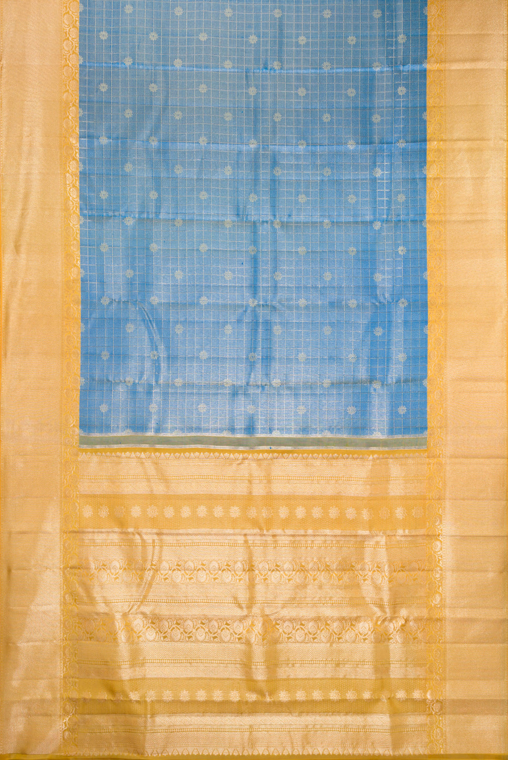 Flat view of Light Blue Kanchipuram Tissue Silk Saree with Zari Brocade on the body and Fancy Border. 