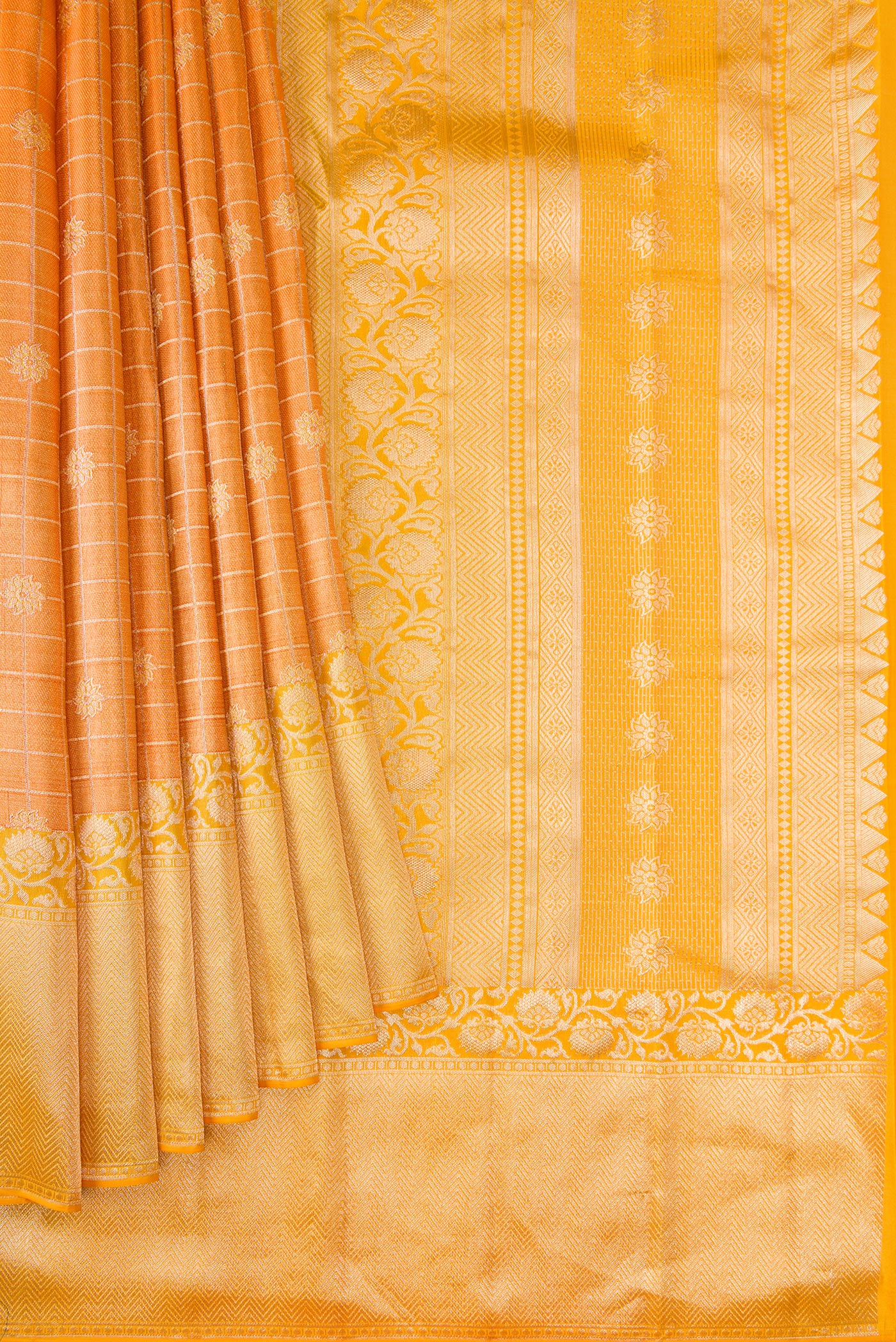Pleats and pallu of Orange Dual Tone Kanchipuram Tissue Silk Saree with Zari Brocade on the body and Fancy Border. 
