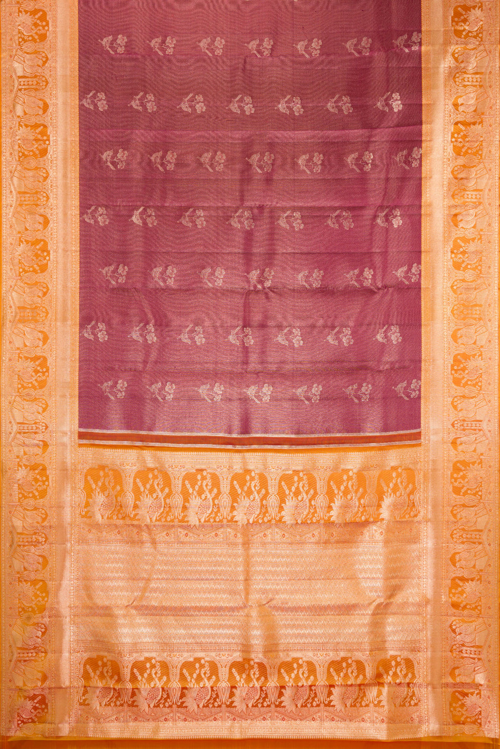 Flat view of Maroon Dual Tone Kanchipuram Tissue Silk Saree with Zari Brocade on the body and Fancy Border. 