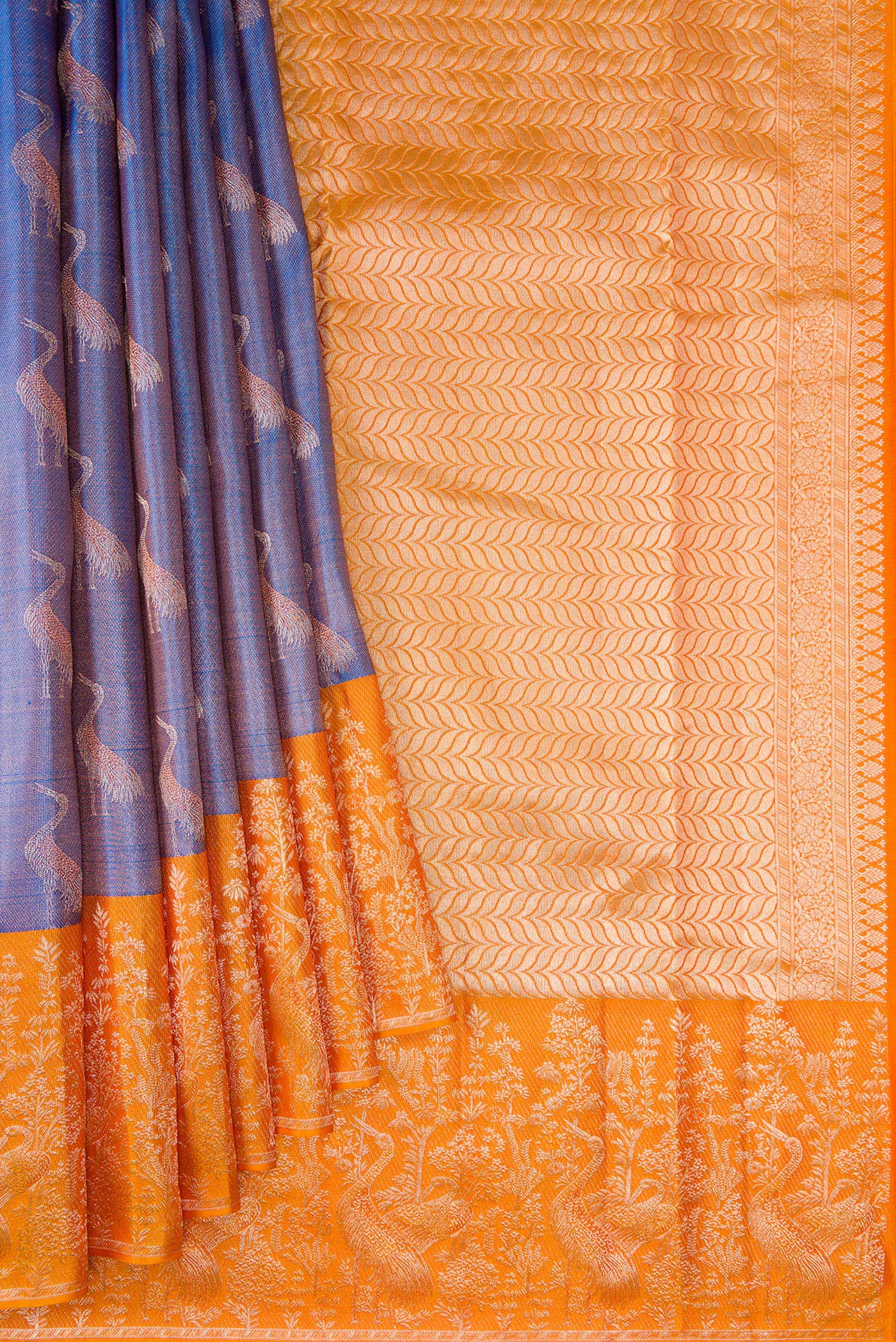 Pleats and pallu of Blue Kanchipuram Tissue Silk Saree with Zari Brocade on the body and Fancy Border. 