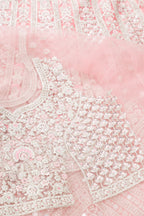 Close up blouse image of Pink Banarasi Silk Womens Lehenga set featuring Embroidered Choli paired with Pink Embroidered Skirt with Embroidered Border and a Embroidered dupatta in Pink