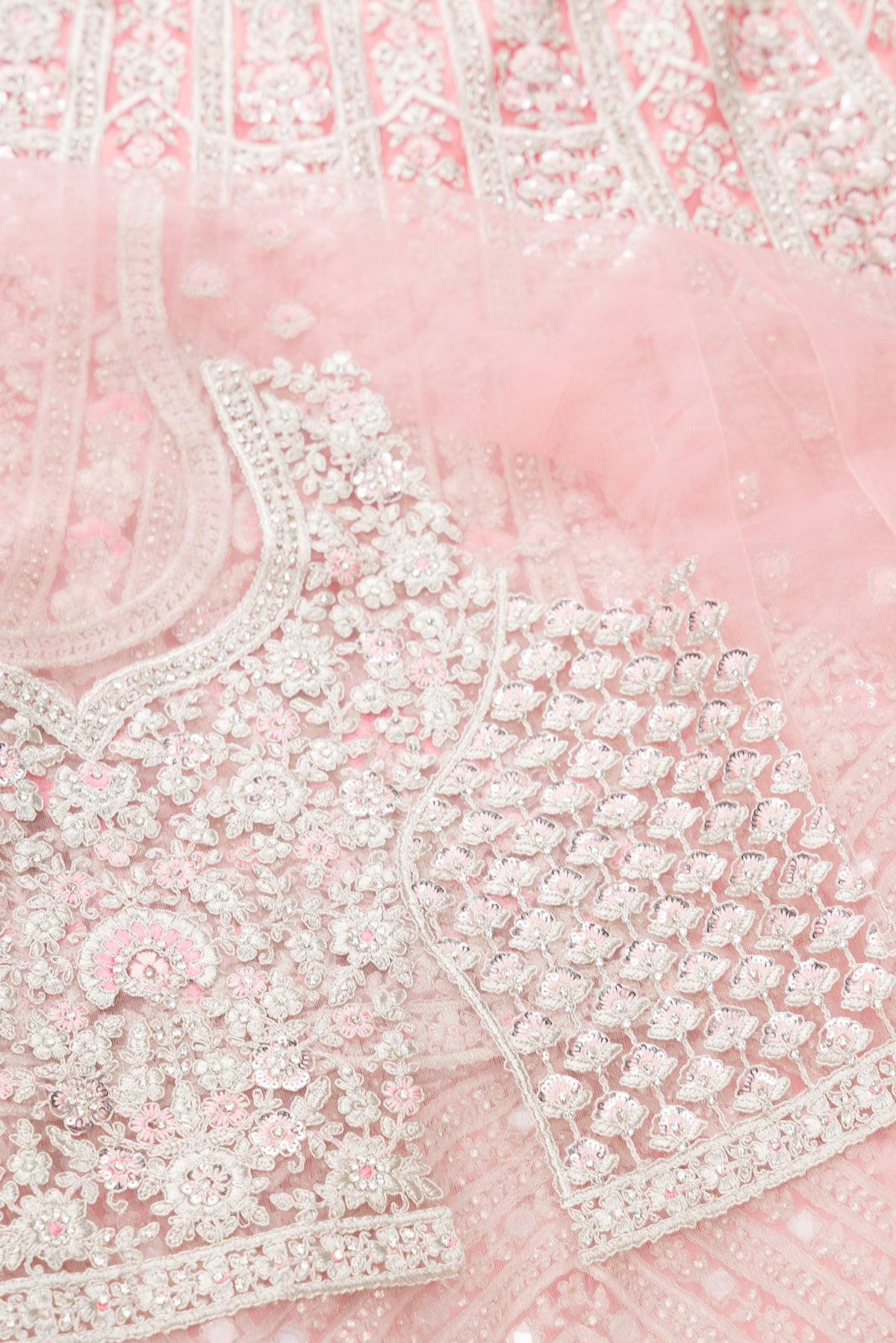 Close up blouse image of Pink Banarasi Silk Womens Lehenga set featuring Embroidered Choli paired with Pink Embroidered Skirt with Embroidered Border and a Embroidered dupatta in Pink