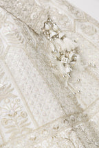 Detailed shot of Off White Banarasi Silk Womens Lehenga set featuring Embroidered Choli paired with Off White Embroidered Skirt with Embroidered Border and a Embroidered dupatta in Off White