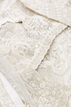 Close up blouse image of Off White Banarasi Silk Womens Lehenga set featuring Embroidered Choli paired with Off White Embroidered Skirt with Embroidered Border and a Embroidered dupatta in Off White