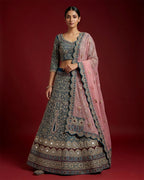 Peacock Blue Banarasi Silk Womens Lehenga set featuring Embroidered Choli paired with Peacock Blue Embroidered Skirt with Embroidered Border and a Embroidered dupatta in Pink