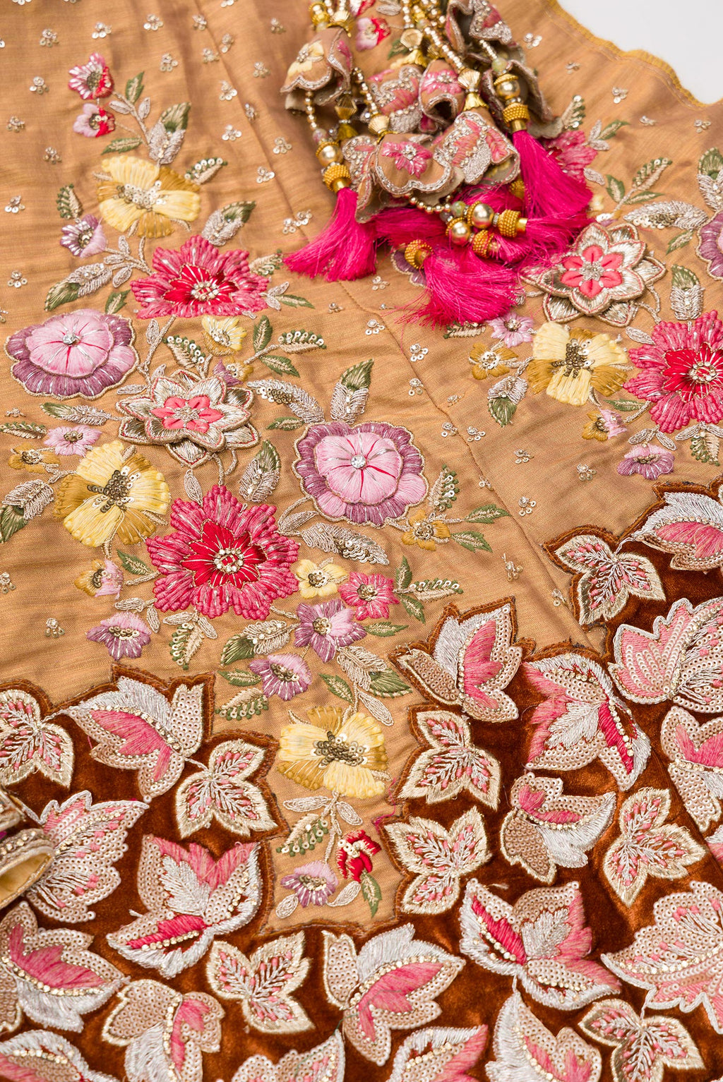 Detailed shot of Golden Peach Banarasi Silk Womens Lehenga set featuring Embroidered Choli paired with Golden Peach Embroidered Skirt with Embroidered Border and a Embroidered dupatta in Golden Peach