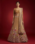 Golden Peach Banarasi Silk Womens Lehenga set featuring Embroidered Choli paired with Golden Peach Embroidered Skirt with Embroidered Border and a Embroidered dupatta in Golden Peach