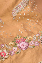 Close up blouse image of Golden Peach Banarasi Silk Womens Lehenga set featuring Embroidered Choli paired with Golden Peach Embroidered Skirt with Embroidered Border and a Embroidered dupatta in Golden Peach