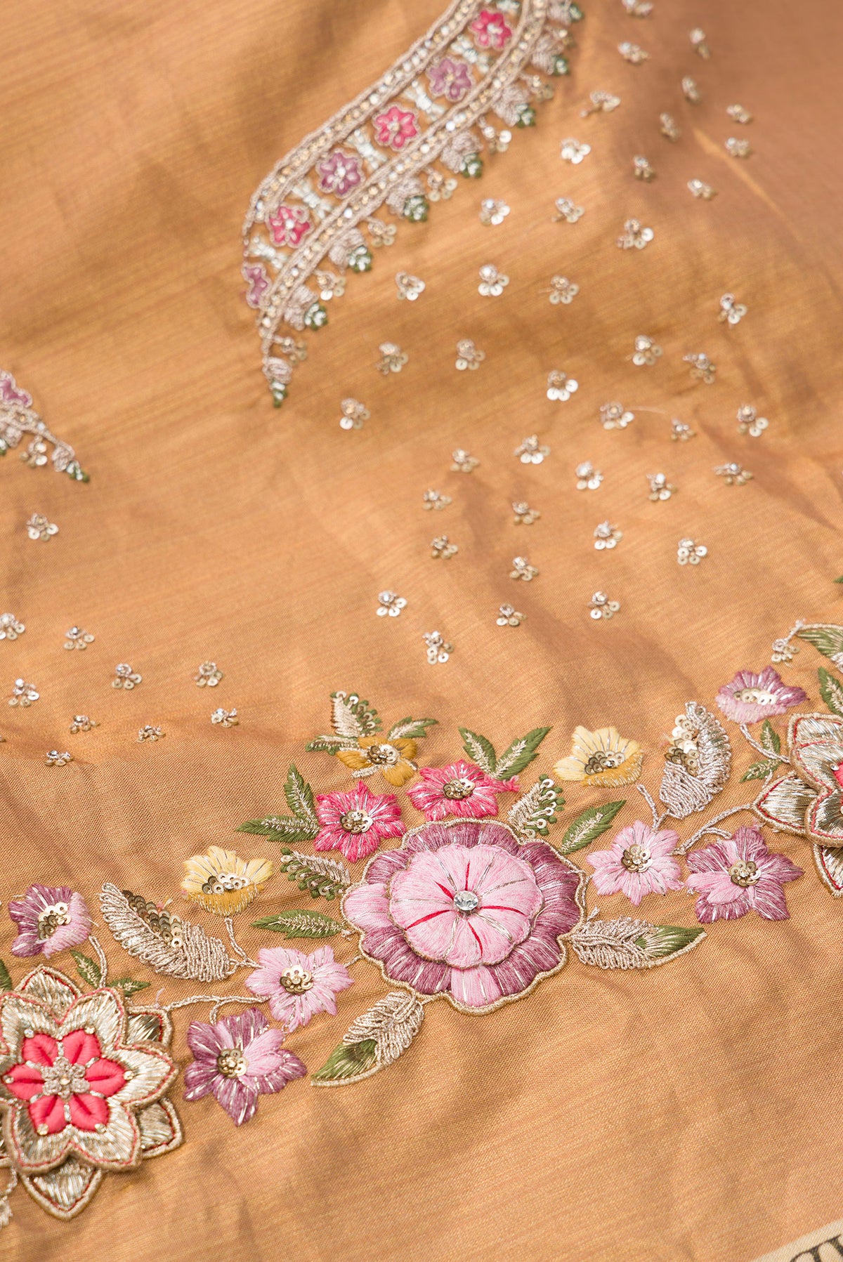 Close up blouse image of Golden Peach Banarasi Silk Womens Lehenga set featuring Embroidered Choli paired with Golden Peach Embroidered Skirt with Embroidered Border and a Embroidered dupatta in Golden Peach