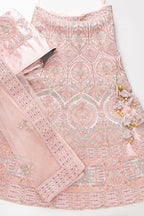 Flat lay of Pink Banarasi Silk Womens Lehenga set featuring Embroidered Choli paired with Pink Embroidered Skirt with Embroidered Border and a Embroidered dupatta in Pink