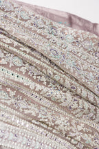 Detailed shot of Lilac Banarasi Silk Womens Lehenga set featuring Embroidered Choli paired with Lilac Embroidered Skirt with Embroidered Border and a Embroidered dupatta in Lilac