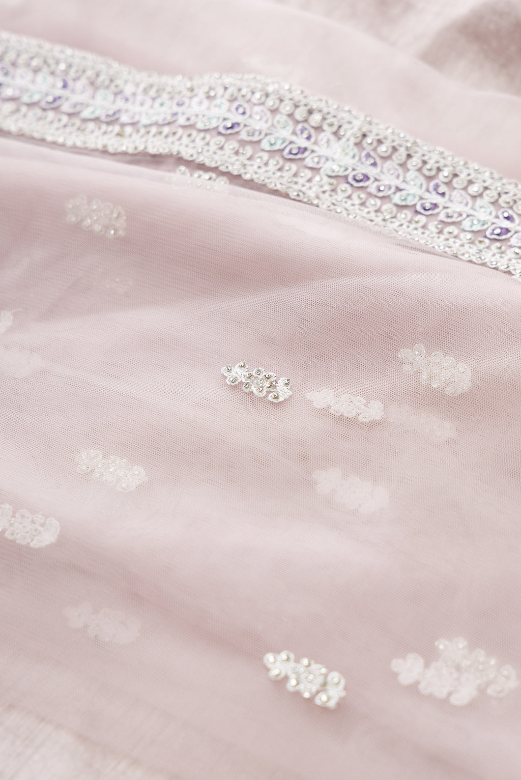 Close up blouse image of Lilac Banarasi Silk Womens Lehenga set featuring Embroidered Choli paired with Lilac Embroidered Skirt with Embroidered Border and a Embroidered dupatta in Lilac