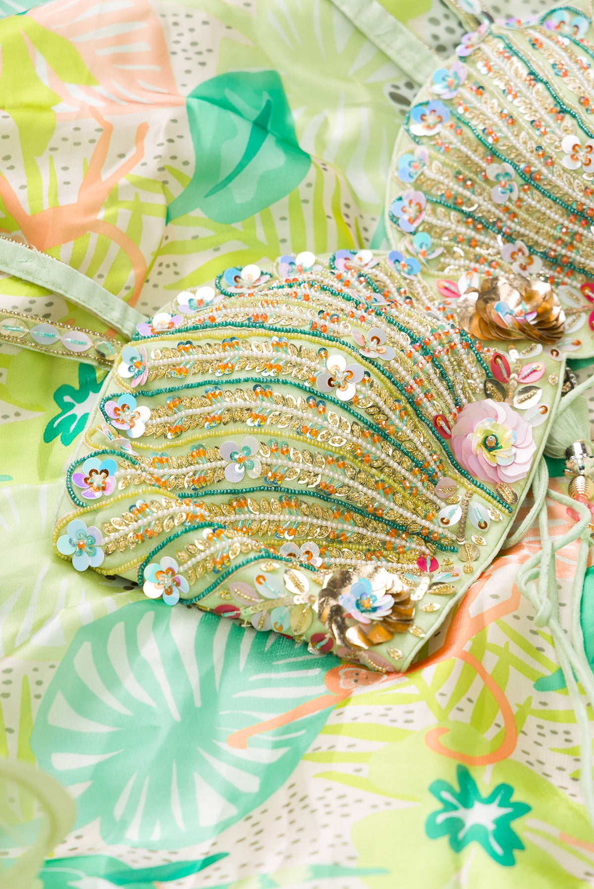 Close up blouse image of Green Banarasi Silk Womens Lehenga set featuring Embroidered Choli paired with Green Embroidered Skirt with Embroidered Border and a Embroidered dupatta in Green