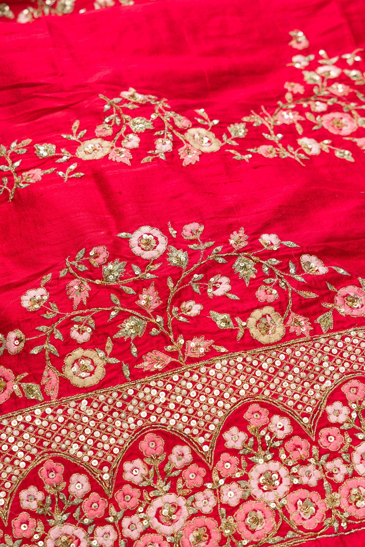 Close up blouse image of Red Banarasi Silk Womens Lehenga set featuring Embroidered Choli paired with Red Embroidered Skirt with Embroidered Border and a Embroidered dupatta in Red
