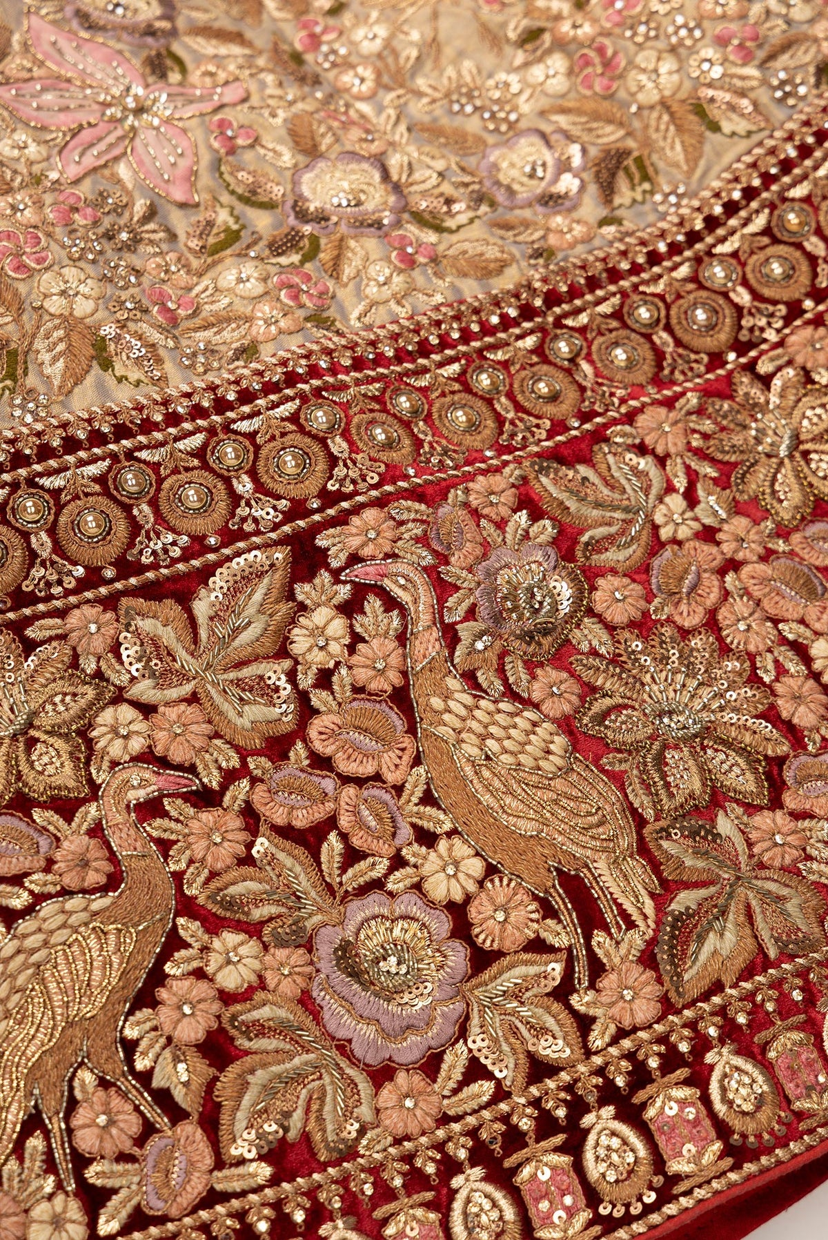 Detailed shot of Red Banarasi Raw Silk Womens Lehenga set featuring Embroidered Choli paired with Pink Embroidered Skirt with Embroidered Border and a Embroidered dupatta in Pink